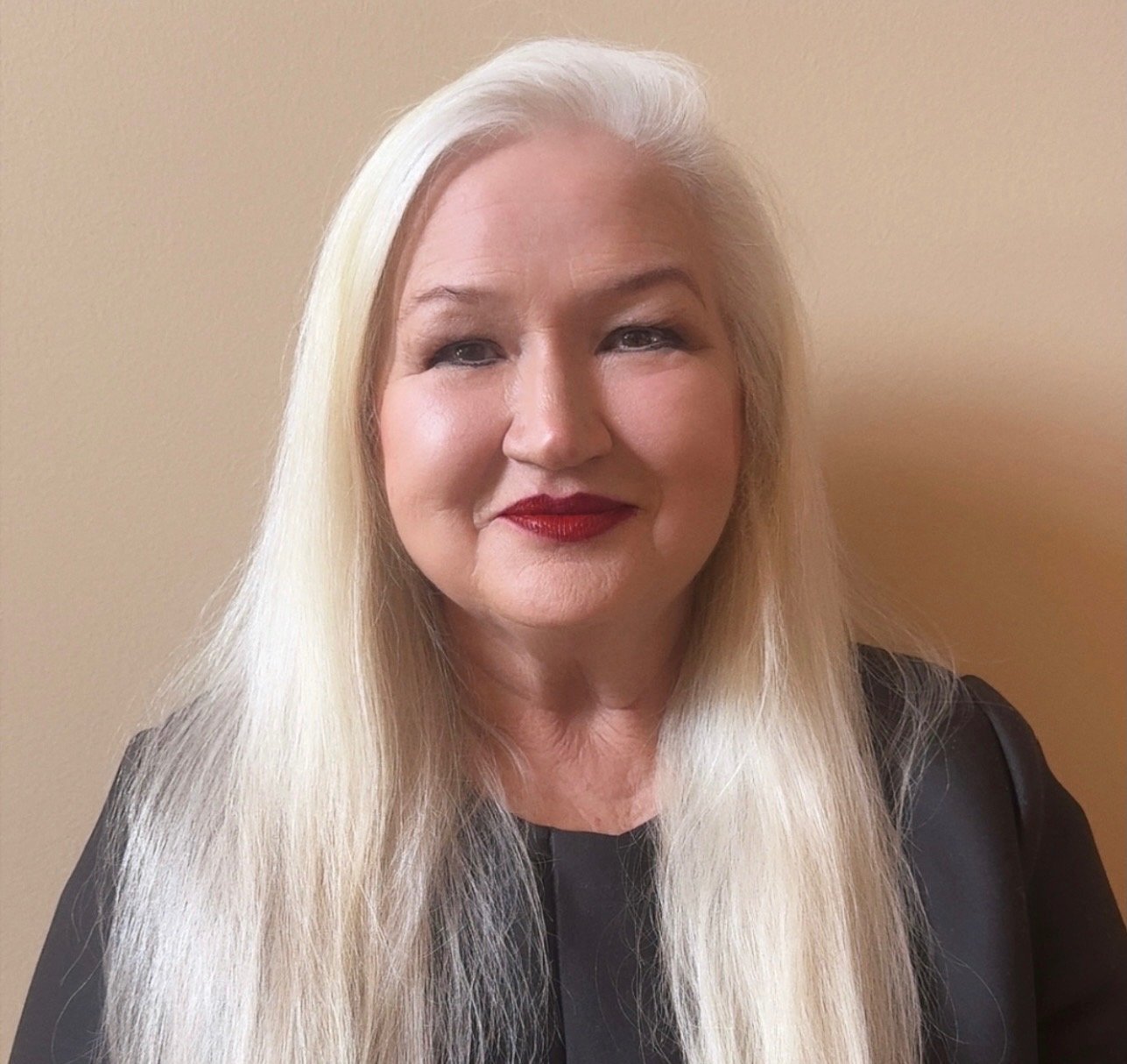 A professional portrait of Tree Martin-Lucas.